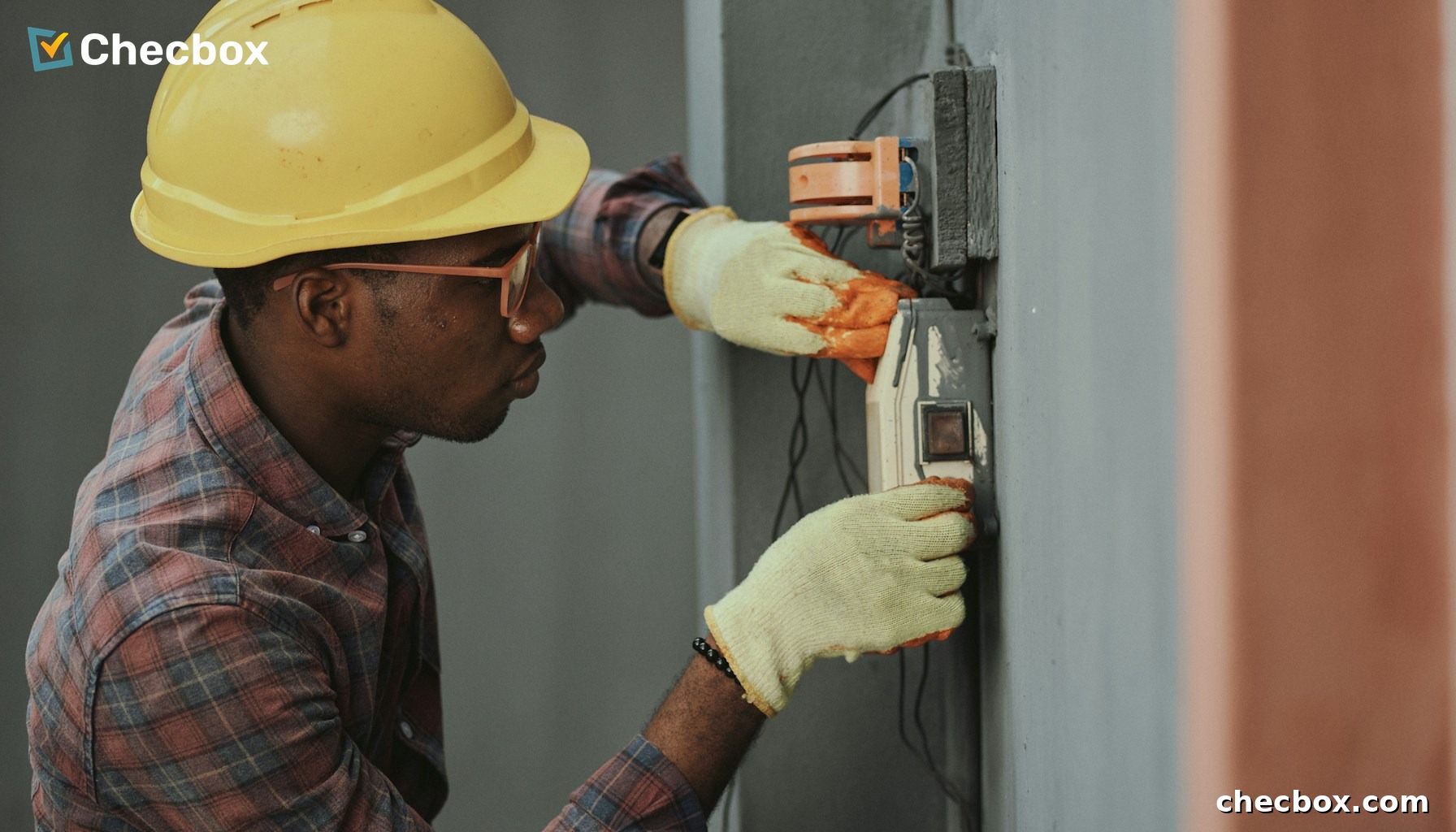 HVAC technician working on air conditioning unit Australia